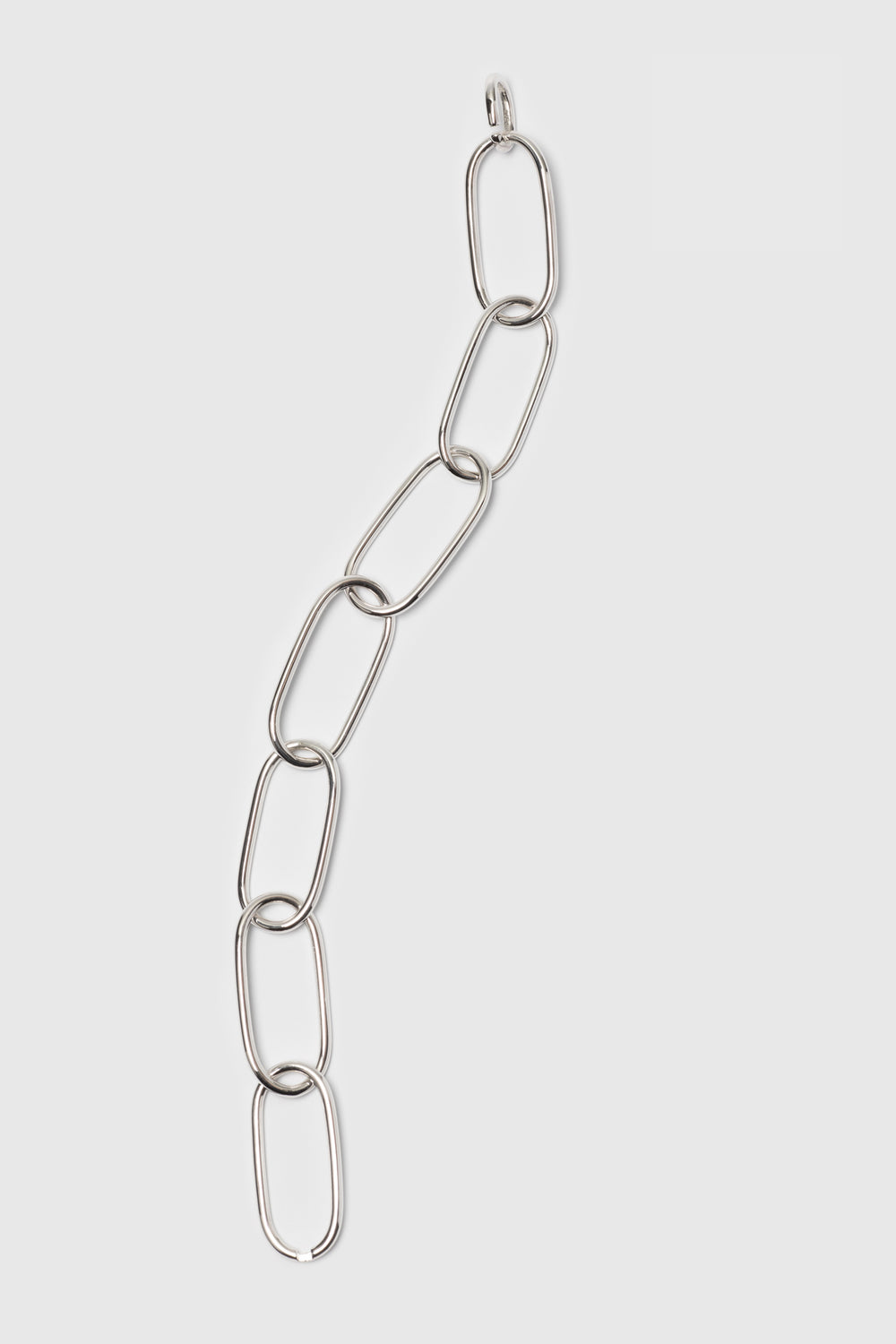 Statement bracelet made from bold link chains with a high gloss finish. Silver jewelry handmade in Berlin.